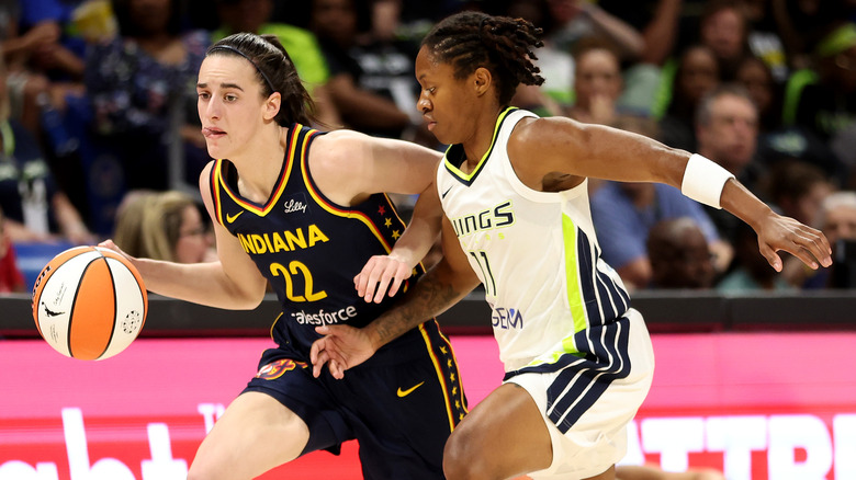 Caitlin Clark dribbling basketball