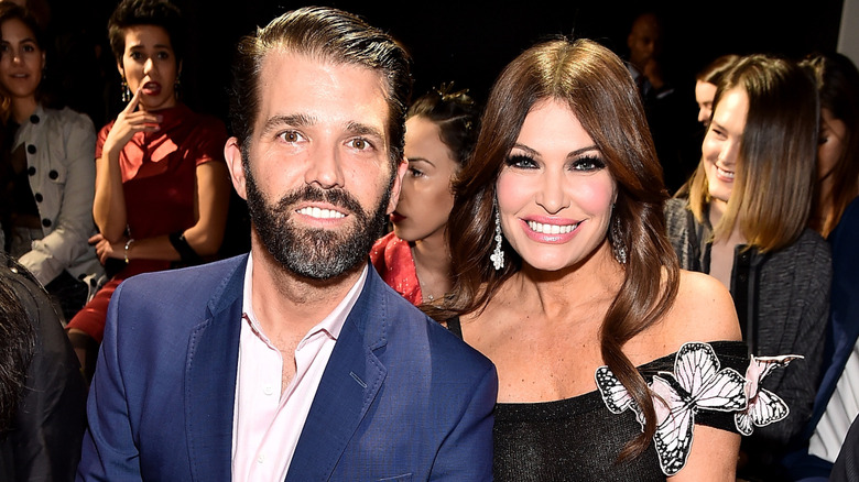 Donald Trump Jr posing with Kimberly Guilfoyle