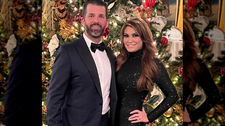 Donald Trump Jr posing with Kimberly Guilfoyle