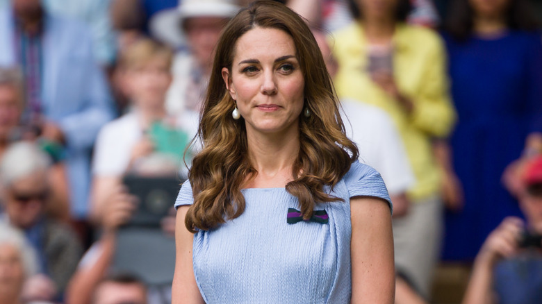 Kate Middleton wearing a blue dress