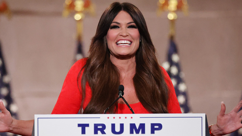 Kimberly Guilfoyle standing at a podium