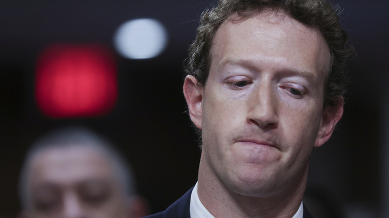 Mark Zuckerberg grimacing