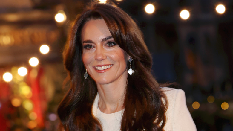 Kate Middleton silver earrings smiling