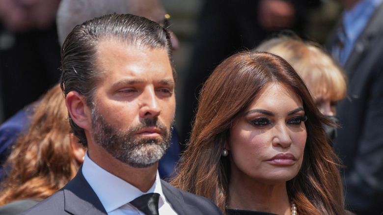 Donald Trump Jr. and Kimberly Guilfoyle serious