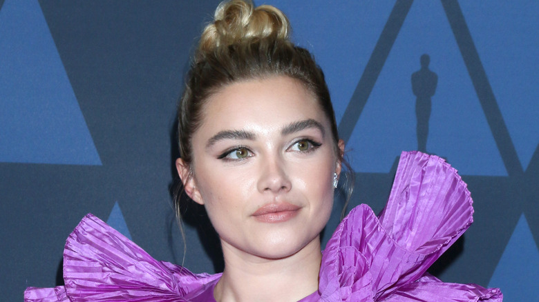 Florence Pugh wearing purple