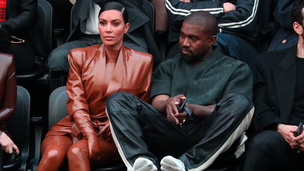 Kim Kardashian West Kanye West at the Balenciaga show during Paris Fashion Week in March 2020