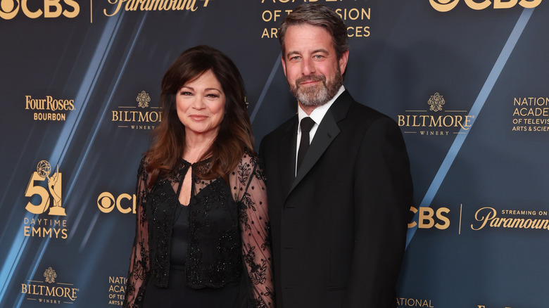 Valerie Bertinelli and Mike Goodnough posing together on the red carpet.