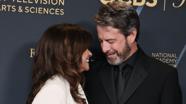 Valerie Bertinelli and Mike Goodnough share a sweet moment on the red carpet for the Daytime Emmys.