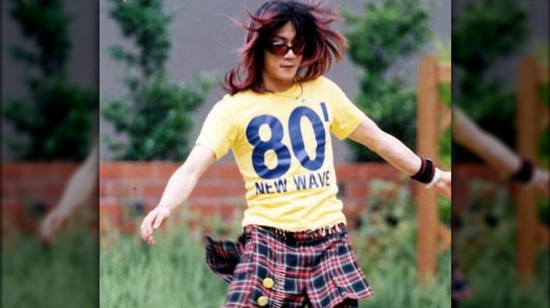 Kami Ukyou Kamimura playing soccer in a t-shirt