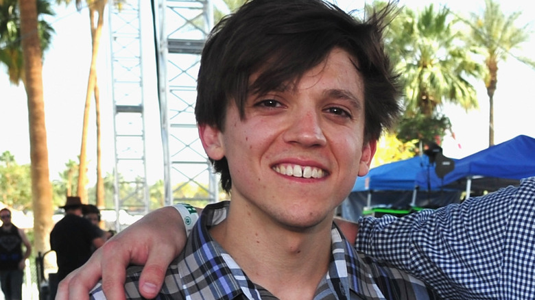 Thomas Fekete smiling at Coachella in 2014