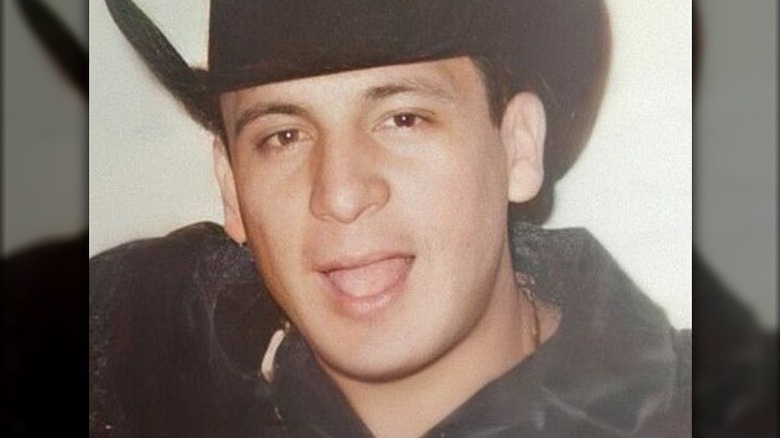 Valentín Elizalde smiling in cowboy hat in 2006