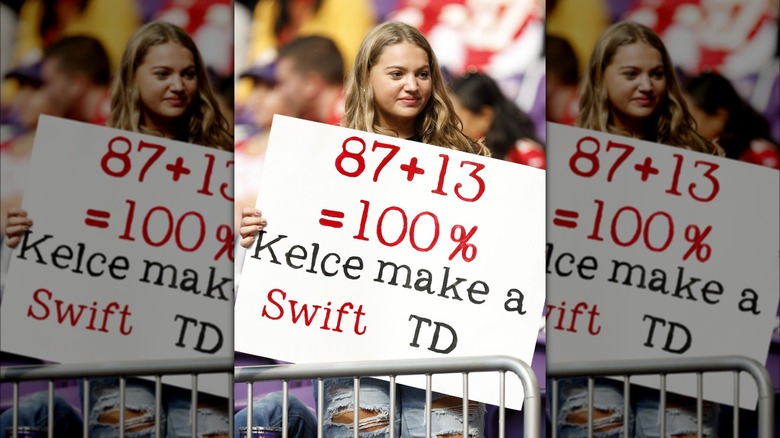 Taylor Swift fan holding sign