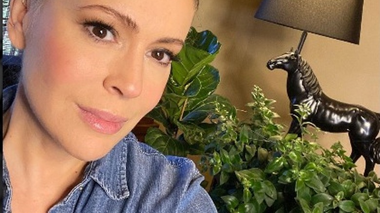 Alyssa Milano smiling plants house