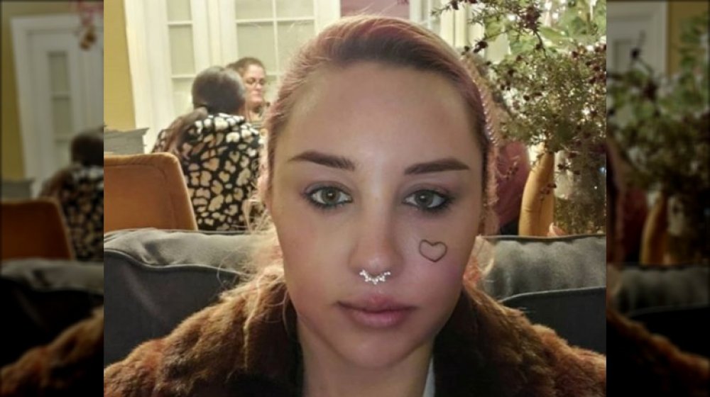 Amanda Bynes' heart face tattoo