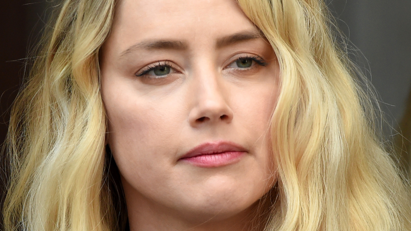 Amber Heard Makes A Rare Public Statement About Embattled Ex Johnny