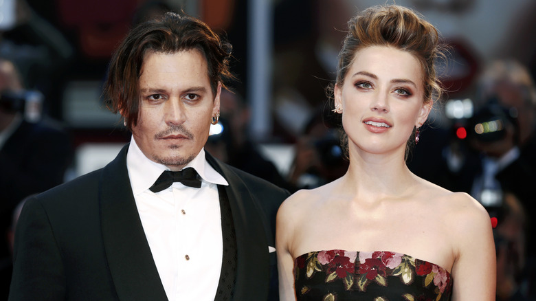 Johnny Depp and Amber Heard attend the premiere of "The Danish Girl"