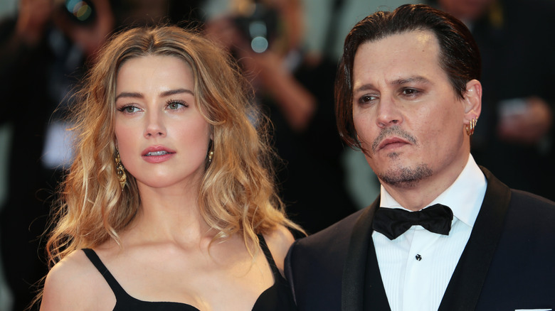 Amber Heard, Johnny Depp posing