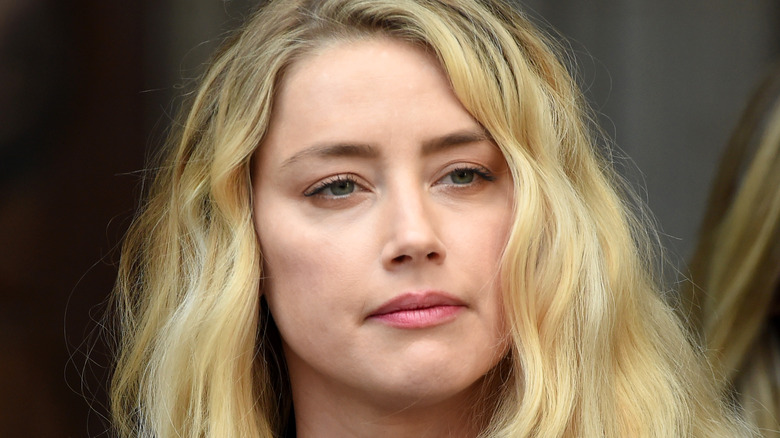 Amber heard looking solemn 