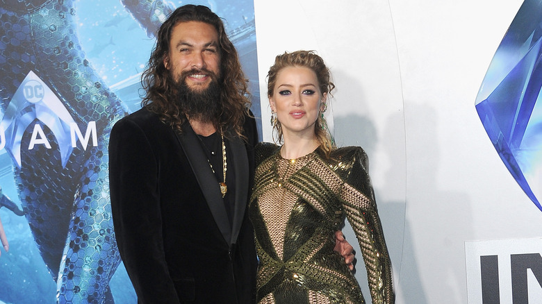 jason Momoa and Amber Heard smiling