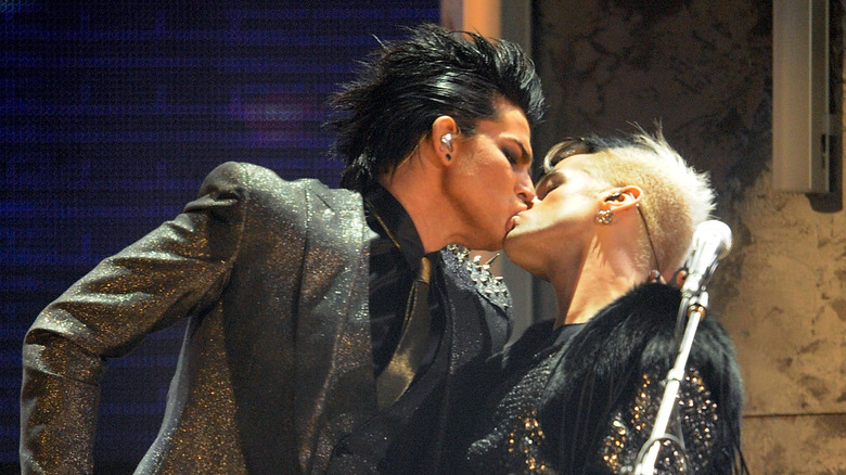 Adam Lambert kisses man onstage