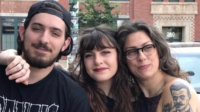 Danielle Colby posing with her kids, Miles and Memphis