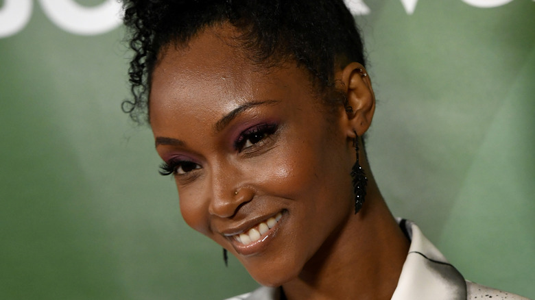 Yaya DaCosta smiling