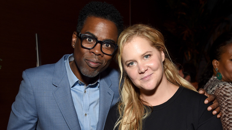 Chris Rock and Amy Schumer smiling