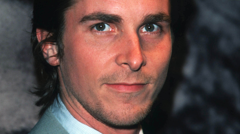 Christian Bale in a gray suit