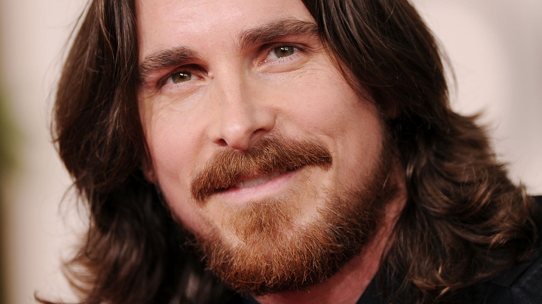 Christian Bale with shoulder length hair