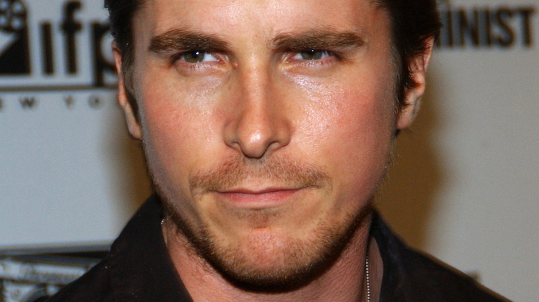 Christian Bale looking to the side