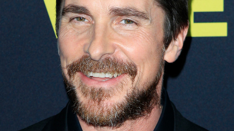 Christian Bale with a big smile