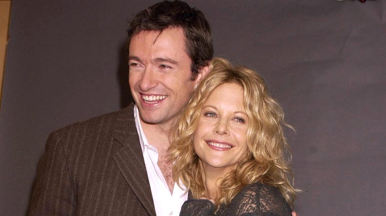 Hugh Jackman and Meg Ryan, both smiling