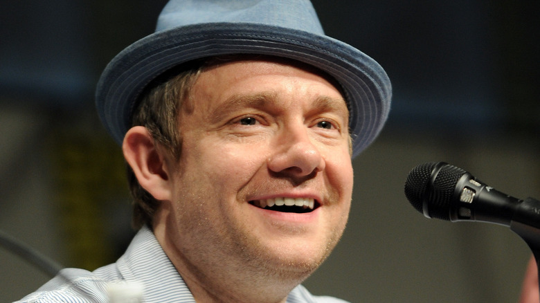 Martin Freeman smiling in trilby