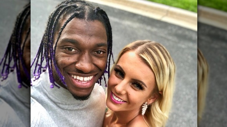 Robert Griffin III and Grete Griffin pose 
