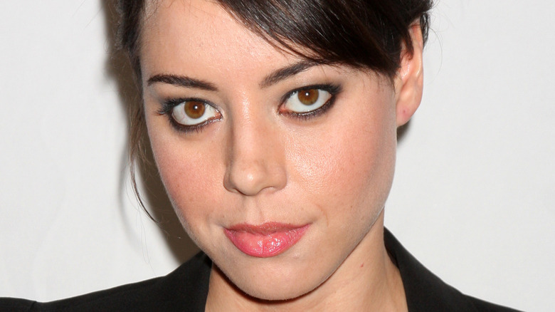 Aubrey Plaza poses