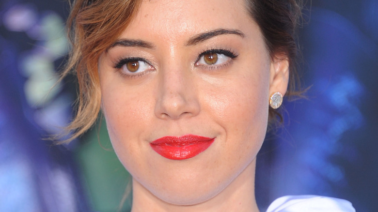 Aubrey Plaza smiles