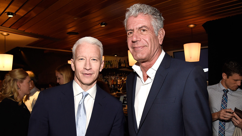 Anderson Cooper poses with Anthony Bourdain