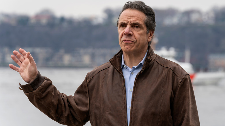 Andrew Cuomo speaking outside and waving