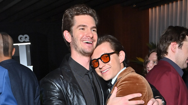 Andrew Garfield hugging Tom Holland