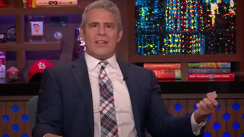 Andy Cohen holding ice