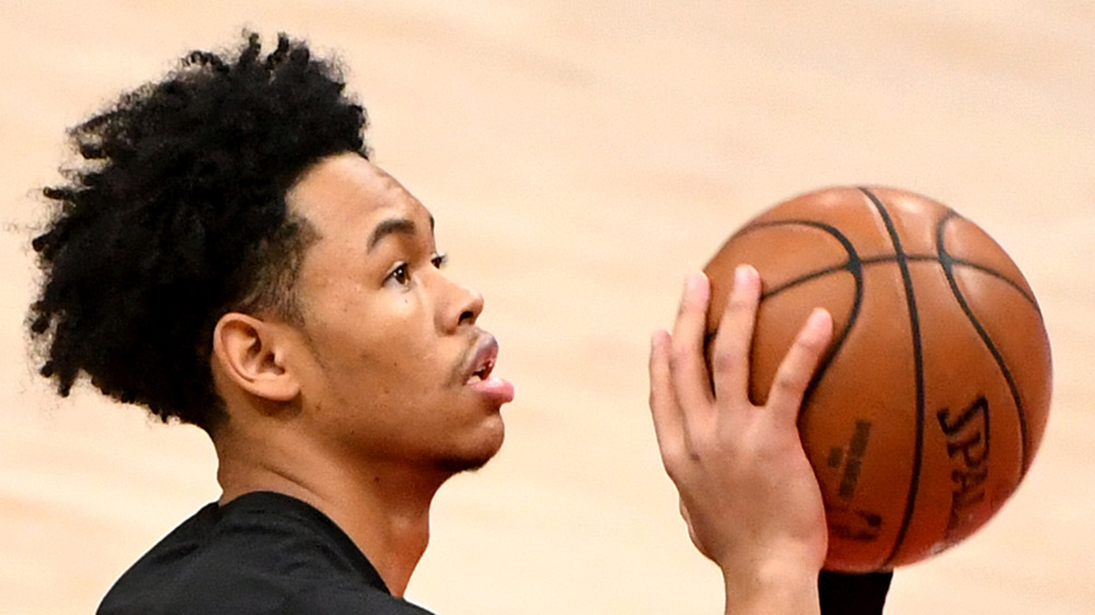 Anfernee Simons looks towards the net as he practices his free throw