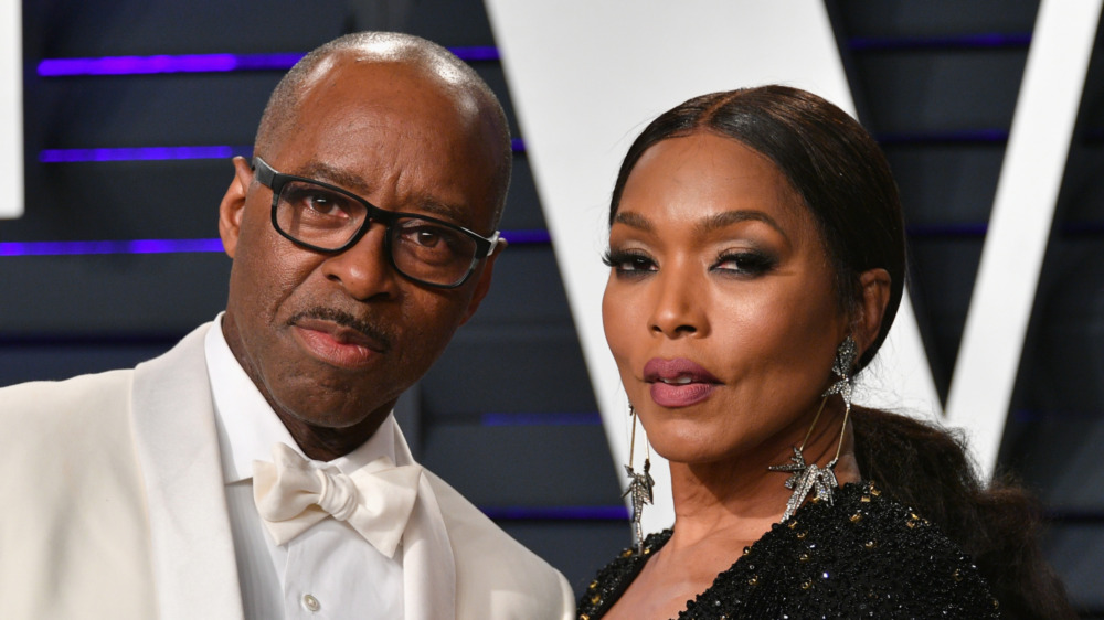 Courtney B. Vance and Angela Bassett pose together 