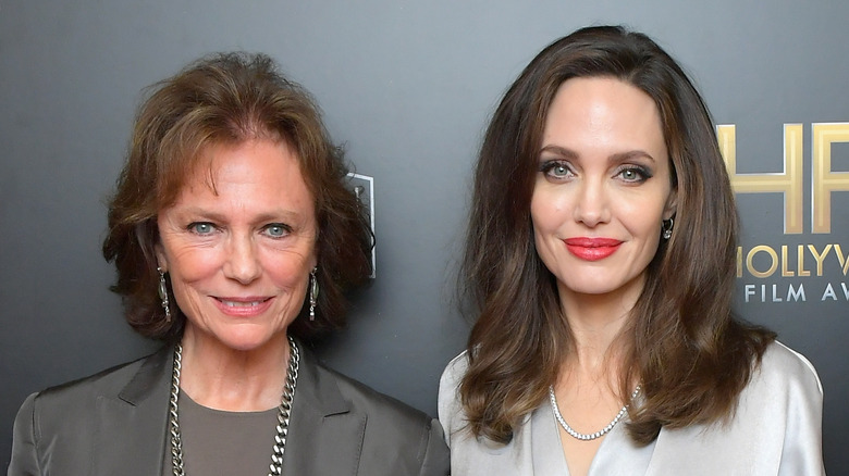 Jacqueline Bisset and Angelina Jolie smiling