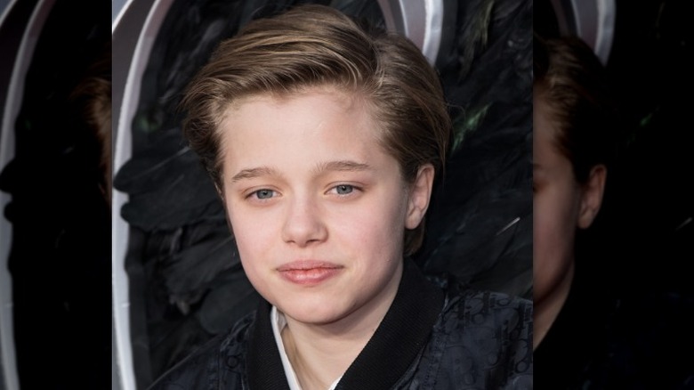 Shiloh Jolie-Pitt posing