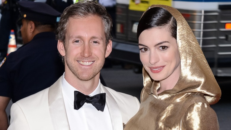 Anne Hathaway and Adam Shulman smiling