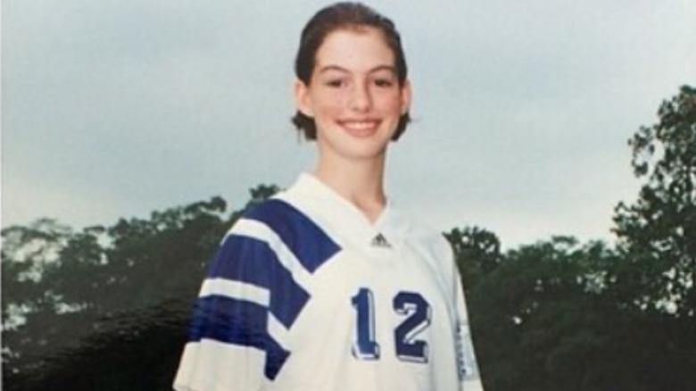 Teen Anne Hathaway smiling