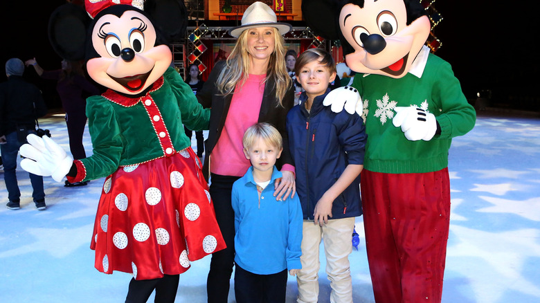 Anne Heche with her children posing next to actors