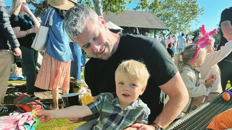 Ant Anstead poses with Hudson in his lap