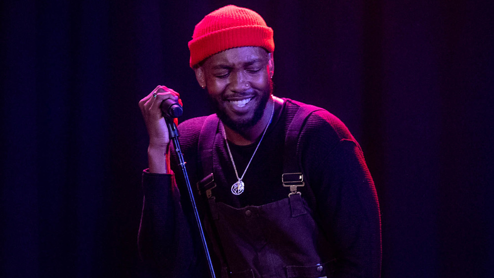 Ant Clemons performing on-stage