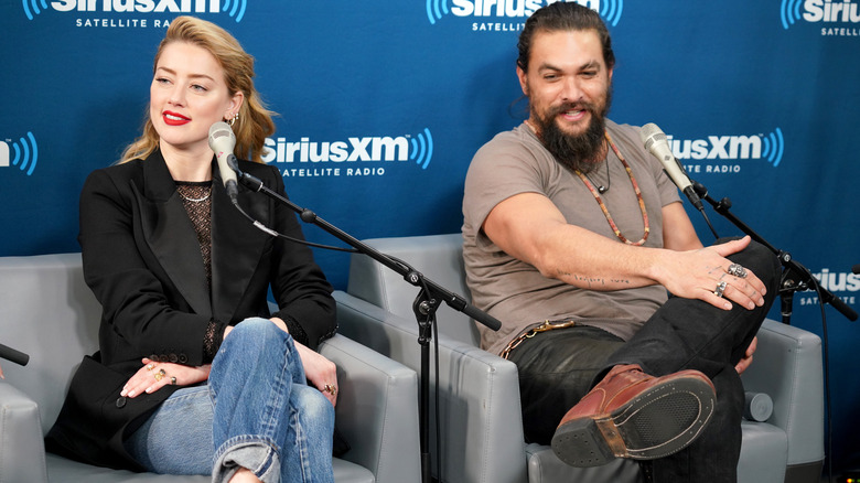 Amber Heard at a press event for "Aquaman" with Jason Momoa